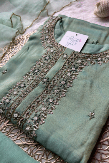 Pastel green silk suit